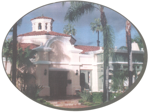 With an exterior reminiscent of an old Mediterranean villa, the interior has dark woods, embossed tin ceilings, imported stained glass, chandeliers, French doors, oak paneling and an antique fireplace and mantle.